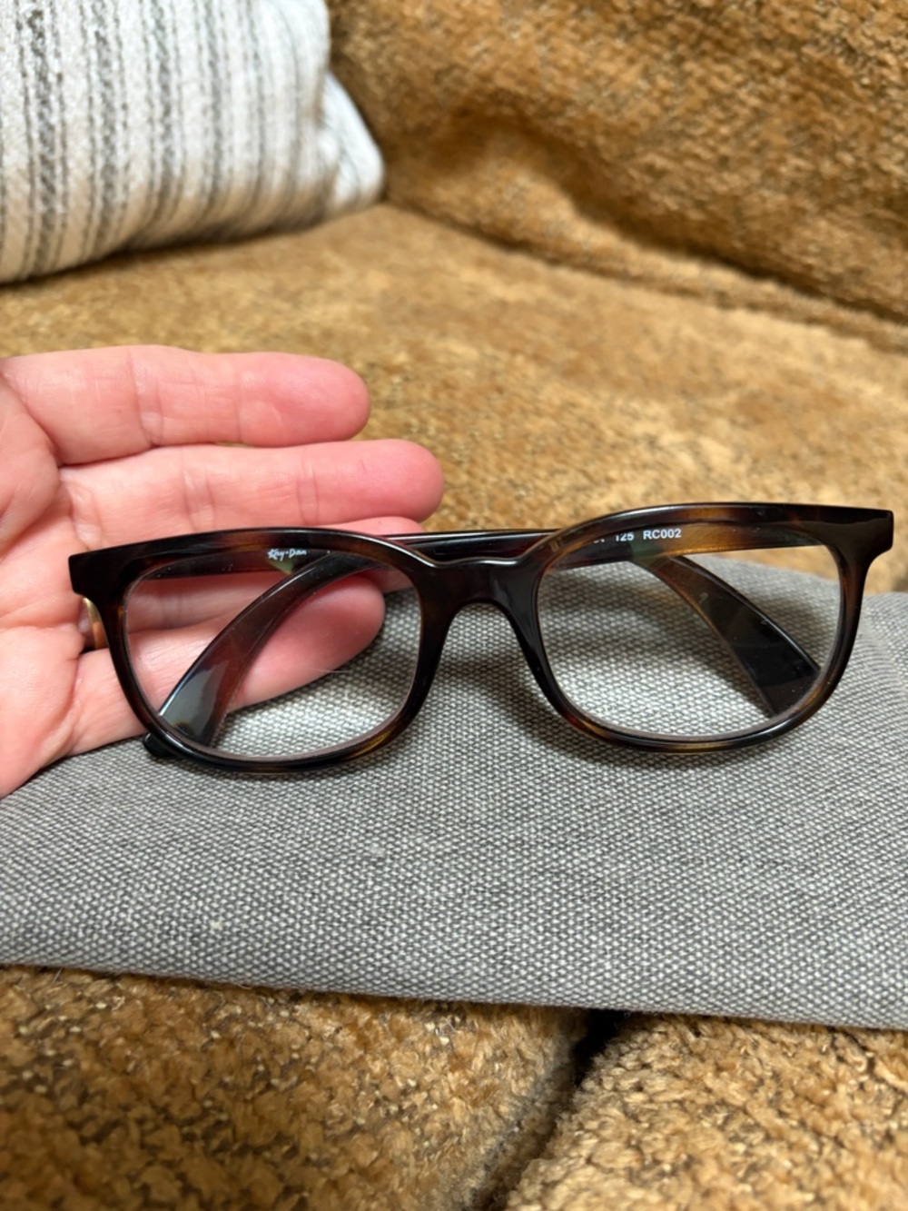 Ray-Ban Tortoise reading glasses.